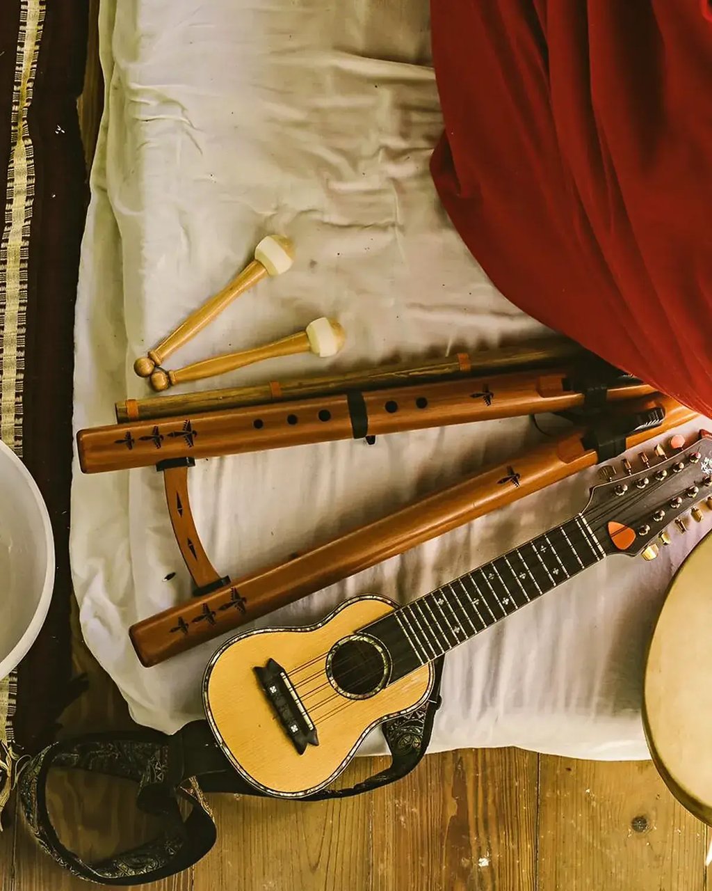 Candlelight, foliage and acoustic instruments arranged for a retreat gathering