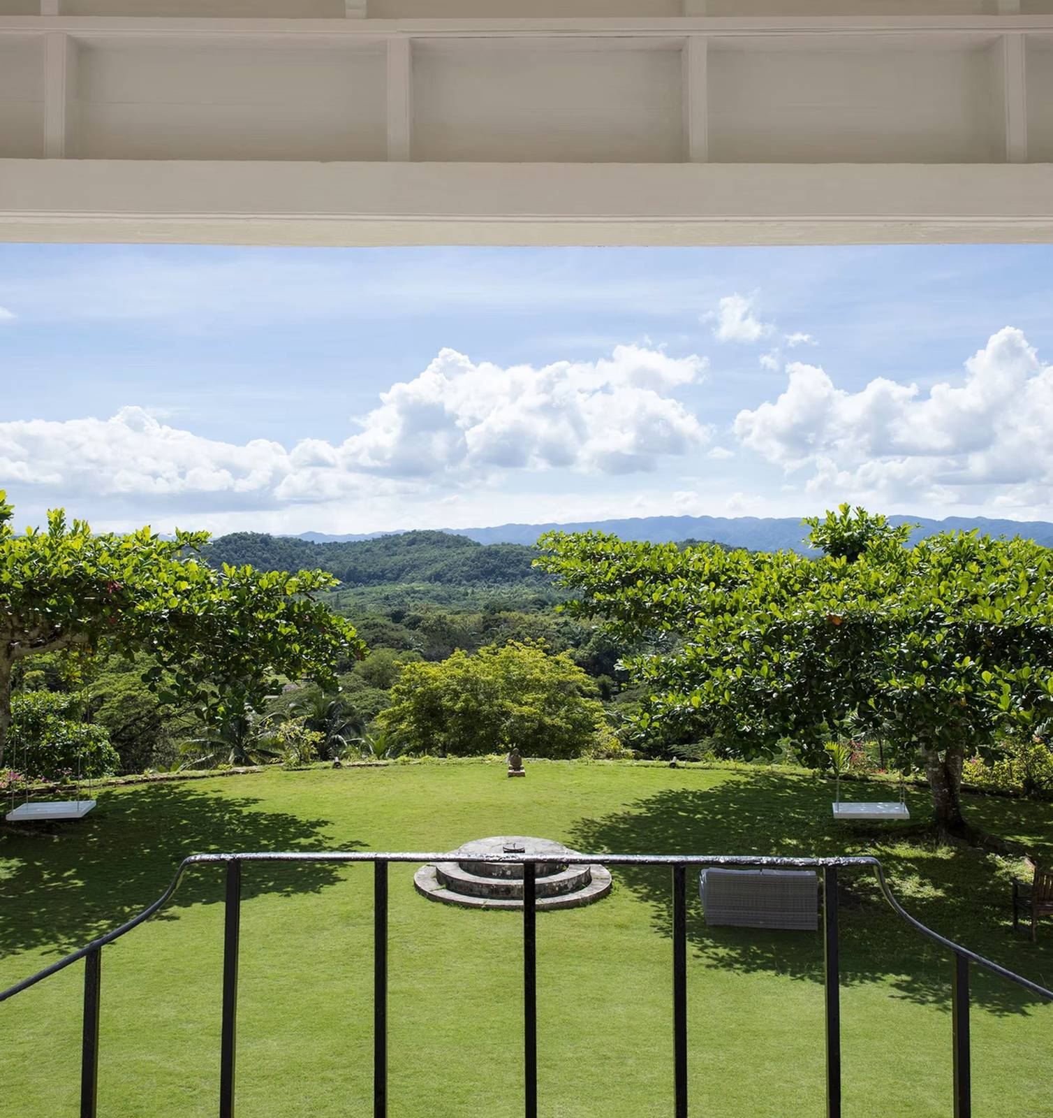The view through the villa arch to the lawn at Good Hope